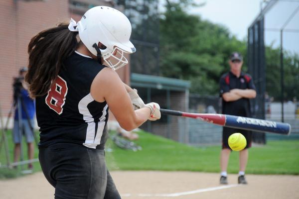 3rd Year varsity softball player Angela Cordova swinging for the fences!