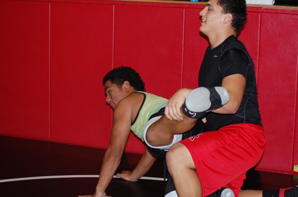 Sophomore Max Gonzales and Junior Deion Fifita prepare for upcoming matches at wreslting practice.
(Quaid Vincent) 