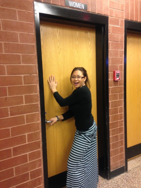 Senior Stephanie O`Keefe Attempts to Enter a Restroom (Alivia Lee)