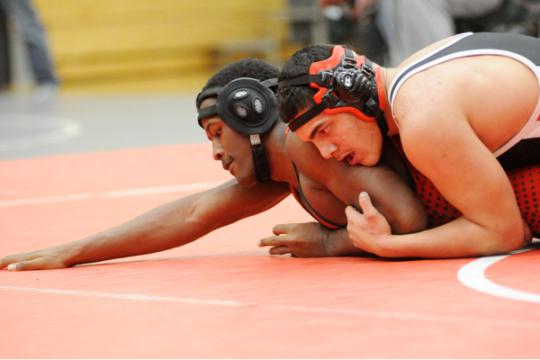 Max Gonzales pinning his opponent (maxpreps.com)