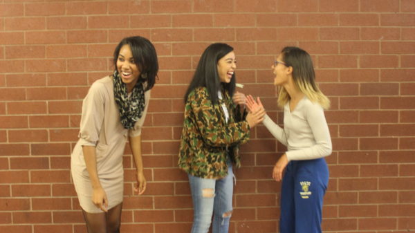 Seniors Lauren Davis (left), Anya Campbell (middle), and Chloe Hobson (right) laughed together during 6th period. A way to get involved in your crushs life is to get involved in their circle.