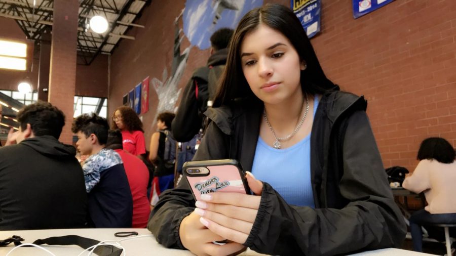 Natalie Luevano, a sophomore at Rangeview, goes through her social media during lunch. Most students tend to be on social media for most of the day to catch up on what’s new regarding friends and news around the world.