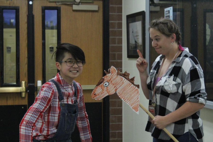 Teacher Miss Ryan chased around one of her art students, junior Glenda Chiang with her best pal, her horse. 