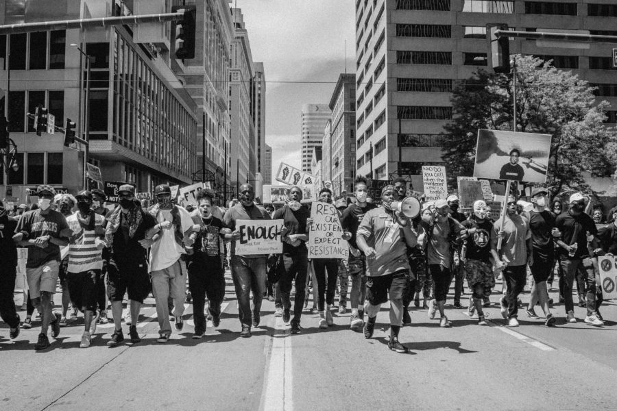 Protestors march down 16th Street in Denver (Peter Vo)