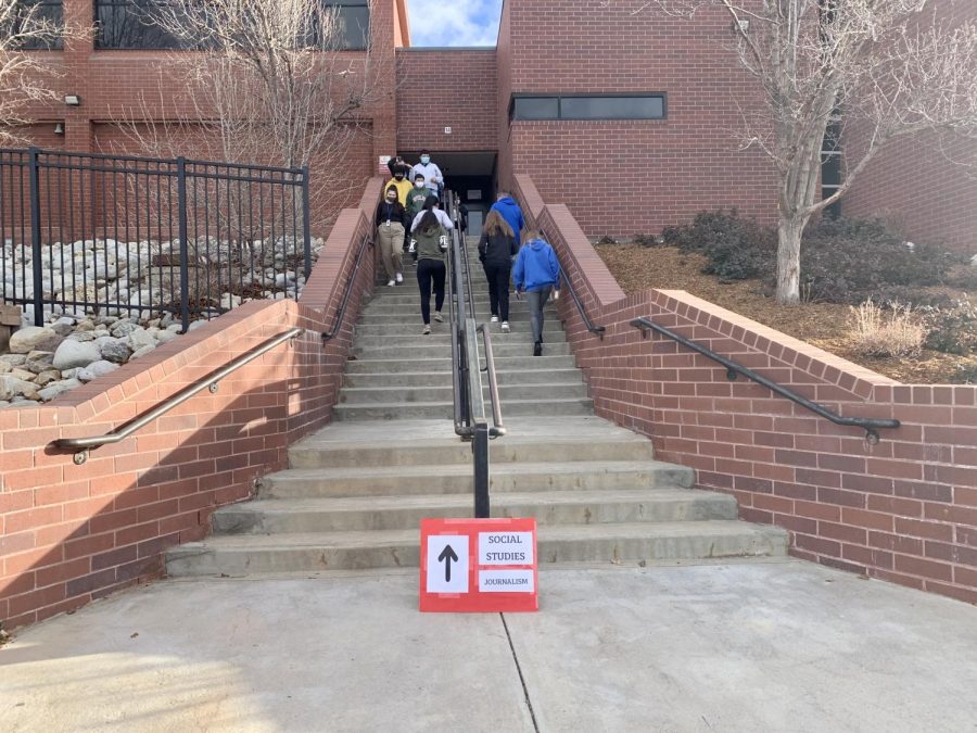 Student use the Journalism/Social Studies entrance. They take their ten minute break outside. (Caroline Smith)