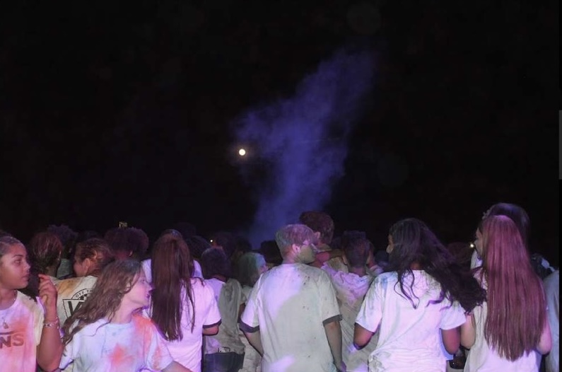 Students celebrating the Back to School Color Dance. (Photo Credits - Lorenzo Muzylowski)