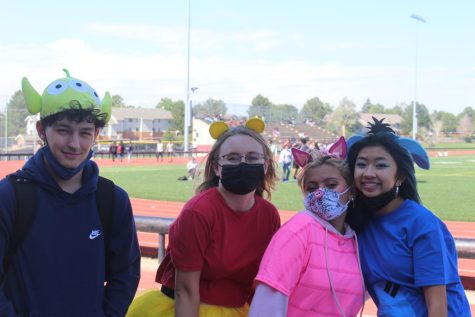 Seniors Jake Bonansinga, Hannah Bonansinga, Nicole Parada, and Vivian Tran pose for a picture during the lunchtime game. Three of them dressed as Winnie the Pooh and friends Piglet, and Eeyore. (Sariah Williams) 