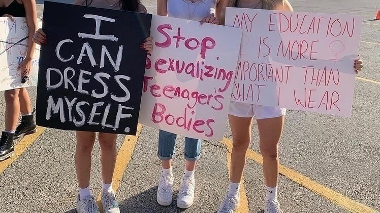 Students protesting against dress code policy at Rush County High School. (Change)