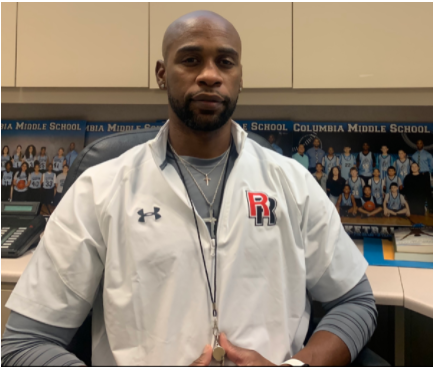 Coach Dixons sitting in his office at Columbia 