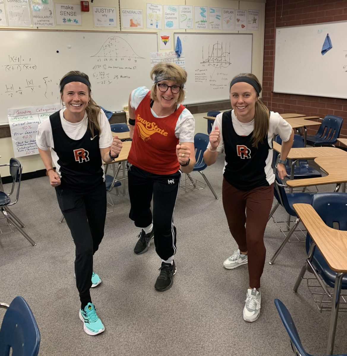 Ms. Larson, Ms. Wetzel, and Ms. Velander dressed up as vintage Track Stars.