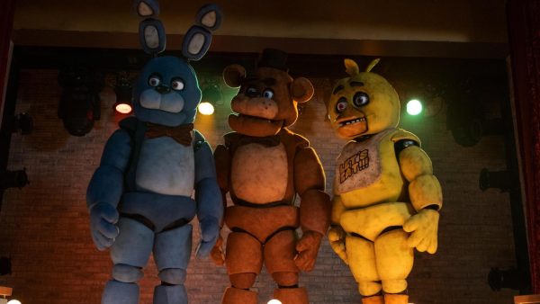 Kevin Foster, Jess Weiss, Jade Kindar-Martin, Garrett Hines, Jessica Blackmore, and Scott Cawthon dressed as their characters in Five Nights at Freddys (2023). 