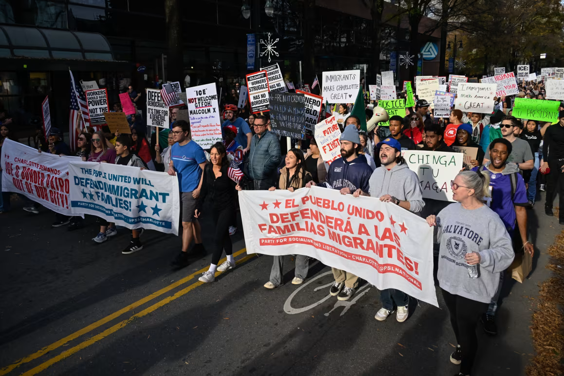 Protesters gather in Charlotte in response to immigration raids that have sparked fear and debate throughout the community.